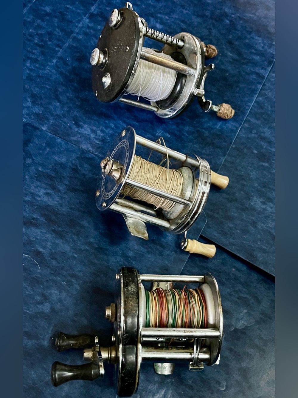 3 vintage USA made fishing reels - Penn Peer No 109, Pflueger Trump, & Kalamazoo